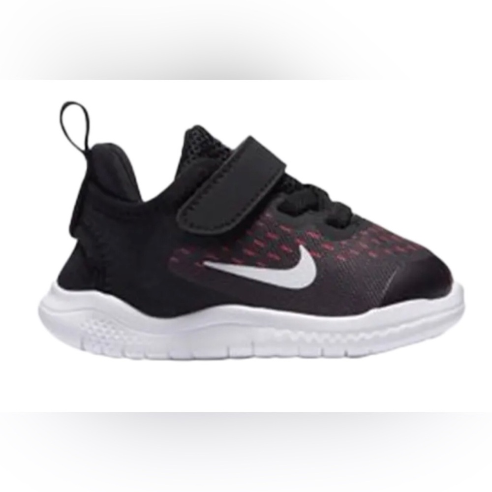 Nike Kids Black Sneakers with Pink Accent and White Swoosh